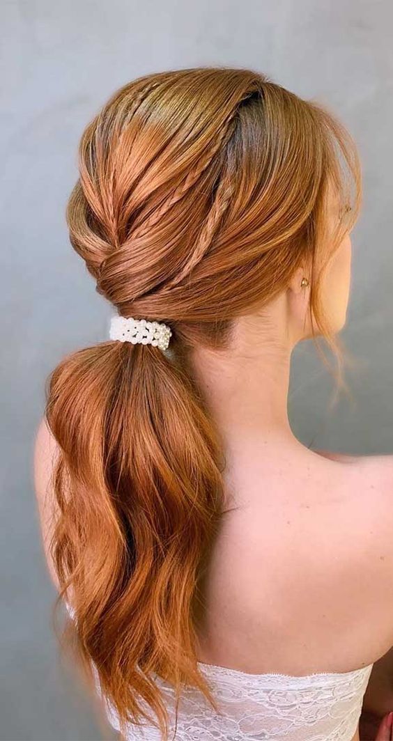 acconciatura sposa coda gonfia con treccine capelli rossi