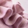 ruche dettaglio su coprispalle in maglia rosa elegante